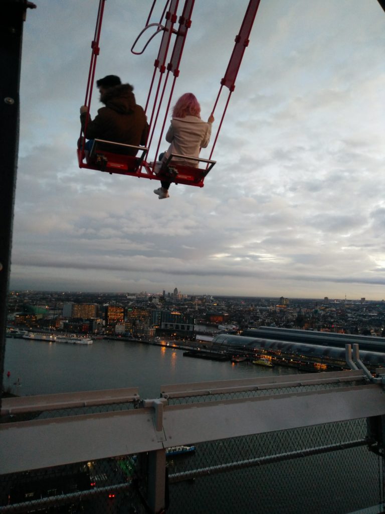Swinging off the top of the A'Dam Lookout tower on rock the city tour